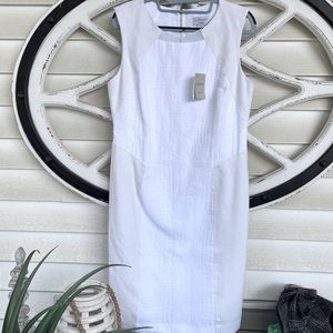 BNWT- Gorgeous white dress with textured details! Size 10